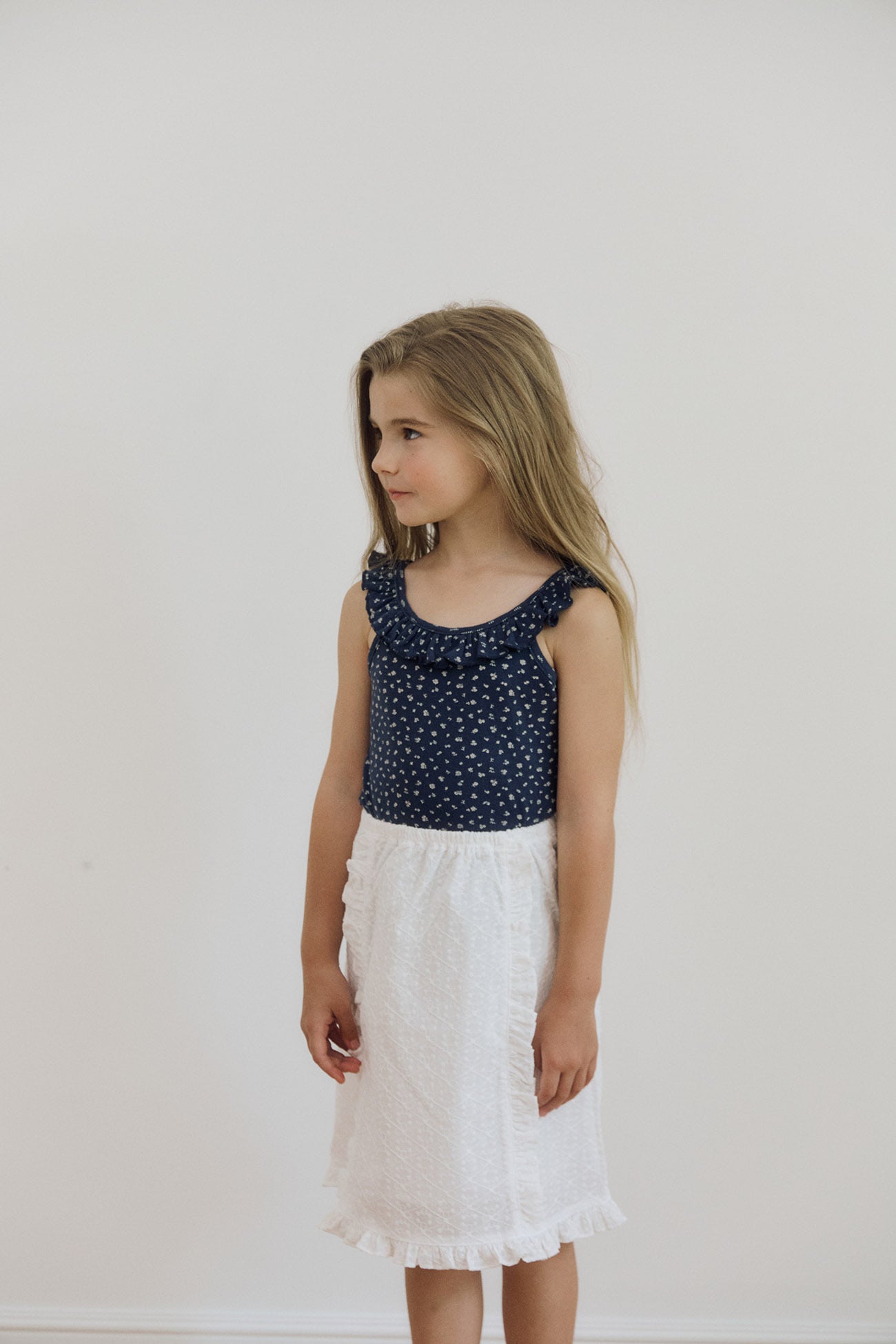 ruffled sleeveless navy