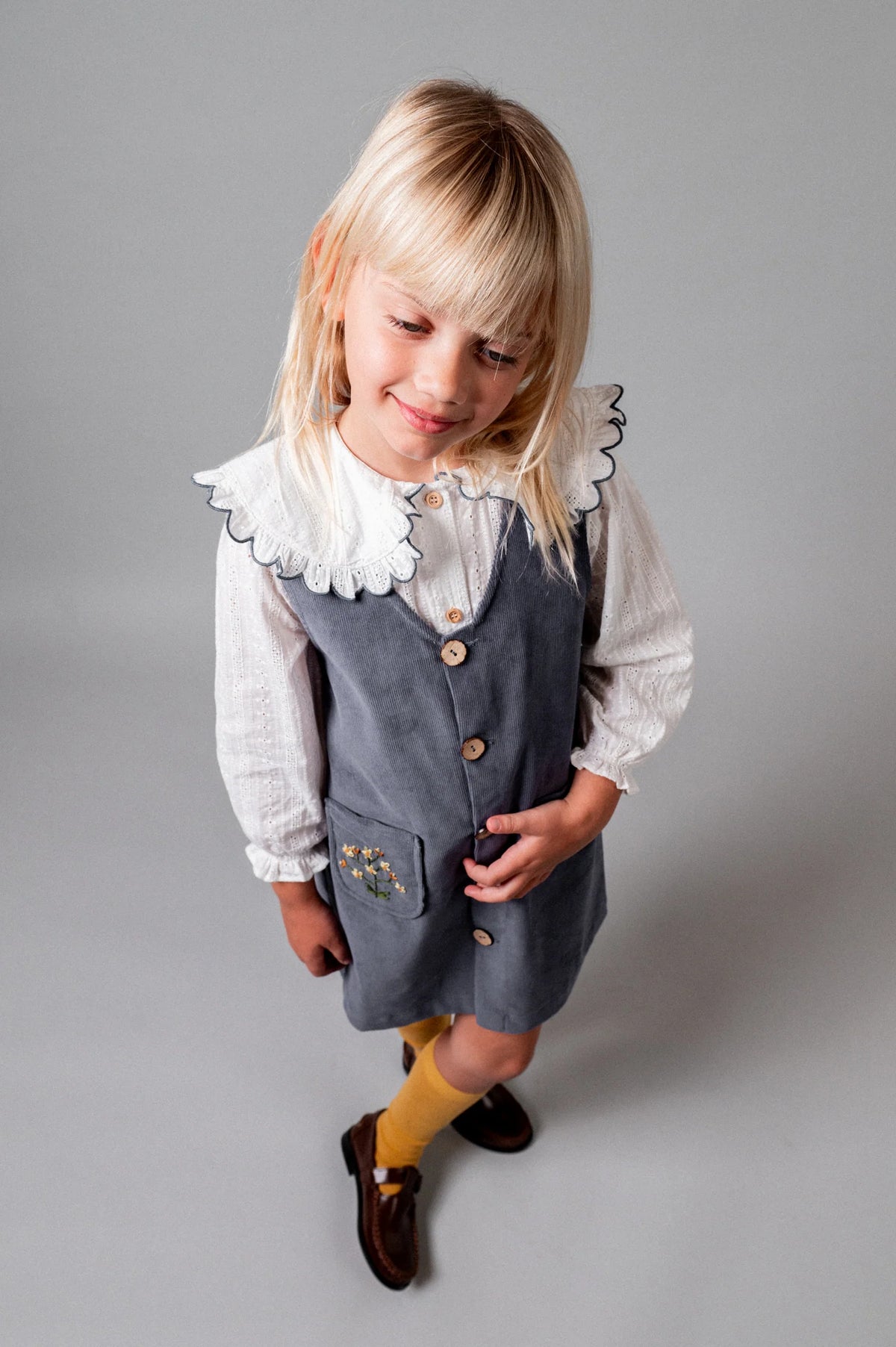 Storm blue corduroy embroidered overall dress
