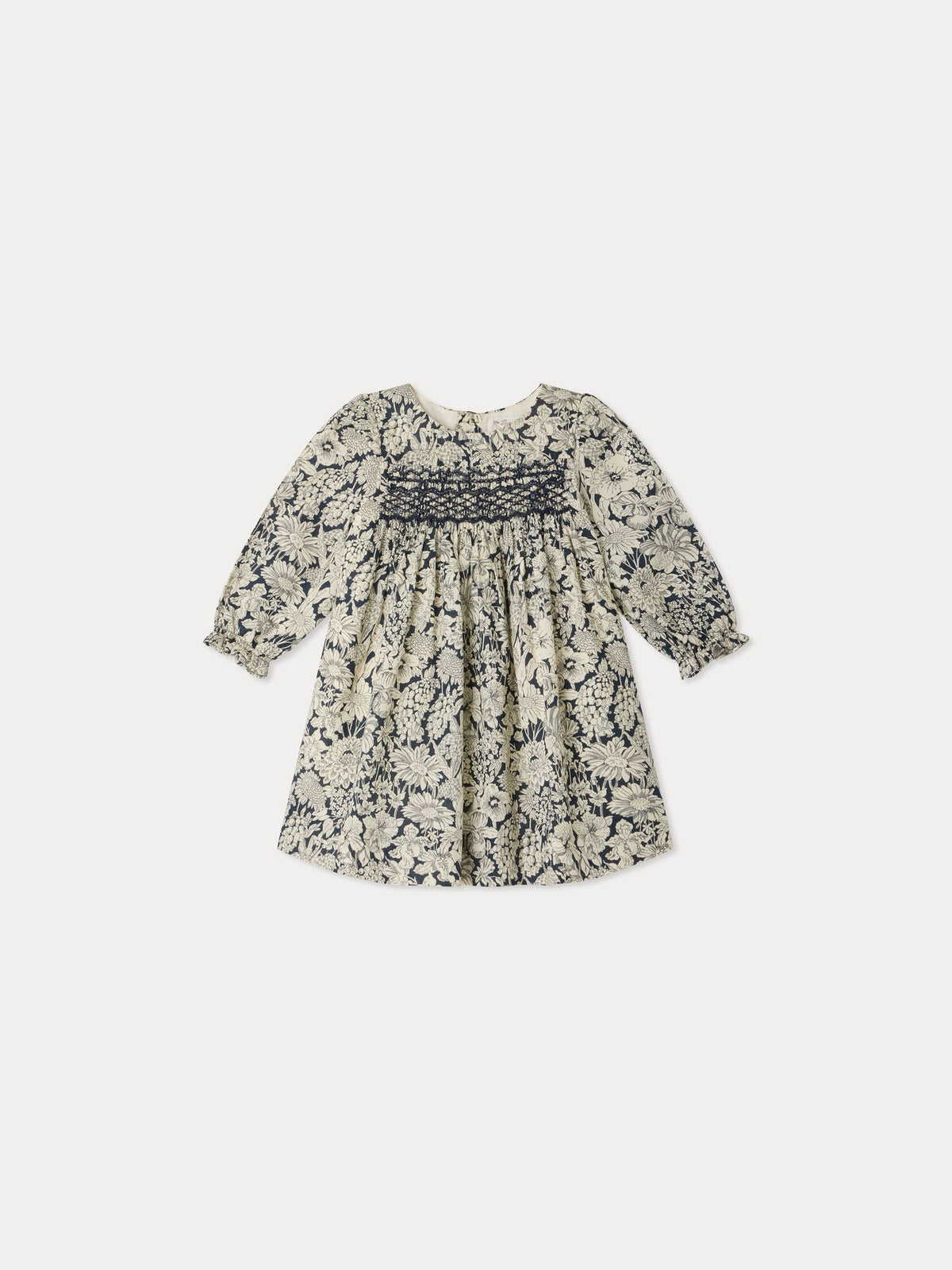 Jailys baby dress in Liberty fabric with smocking and hand embroidery in organic cotton